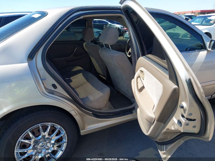 2000 Toyota Camry Le VIN: JT2BG22K3Y0395374 Lot: 43291693