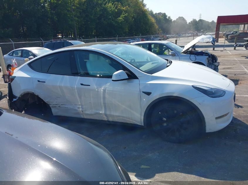 2023 Tesla Model Y Awd/Long Range Dual Motor All-Wheel Drive VIN: 7SAYGDEE8PF633550 Lot: 43292141