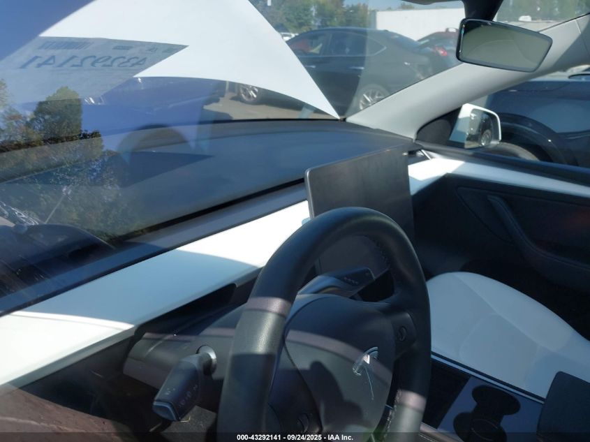 2023 Tesla Model Y Awd/Long Range Dual Motor All-Wheel Drive VIN: 7SAYGDEE8PF633550 Lot: 43292141