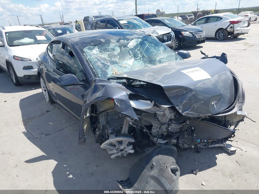 TESLA MODEL 3 2023. Lot# 43295052. VIN 5YJ3E1EA0PF569044. Photo 1
