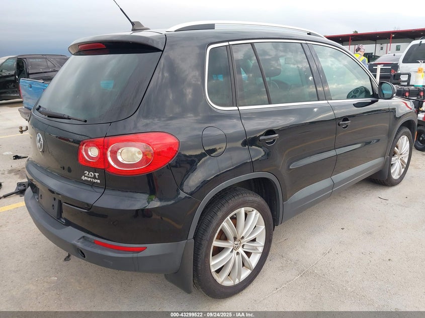 WVGBV7AX6BW559840 2011 VOLKSWAGEN TIGUAN photo no. 4