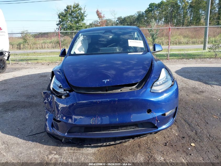 2023 Tesla Model Y Awd/Long Range Dual Motor All-Wheel Drive VIN: 7SAYGDEE7PA137281 Lot: 43299610