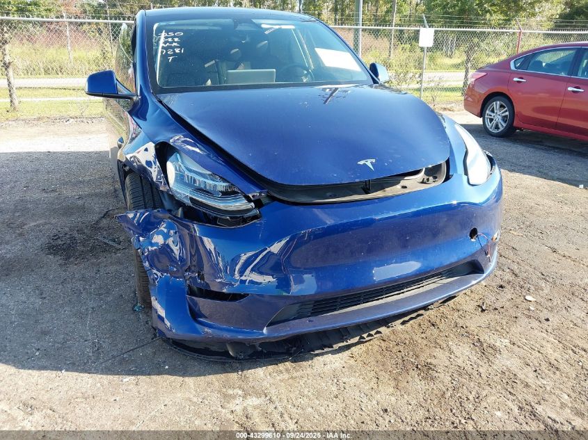 2023 Tesla Model Y Awd/Long Range Dual Motor All-Wheel Drive VIN: 7SAYGDEE7PA137281 Lot: 43299610