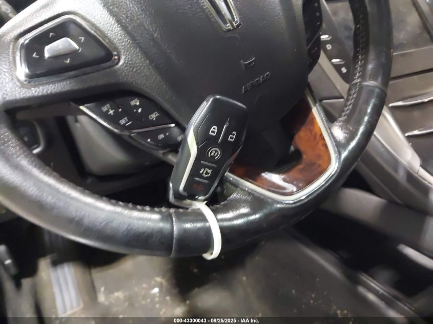 2014 Lincoln Mkz VIN: 3LN6L2J9XER811804 Lot: 43300043