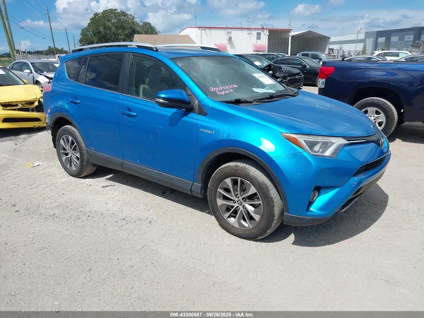 2016 TOYOTA RAV4 HYBRID XLE - JTMRJREV6GD059103