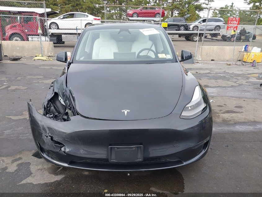 2024 Tesla Model Y Long Range Dual Motor All-Wheel Drive VIN: 7SAYGDEEXRA255294 Lot: 43300864