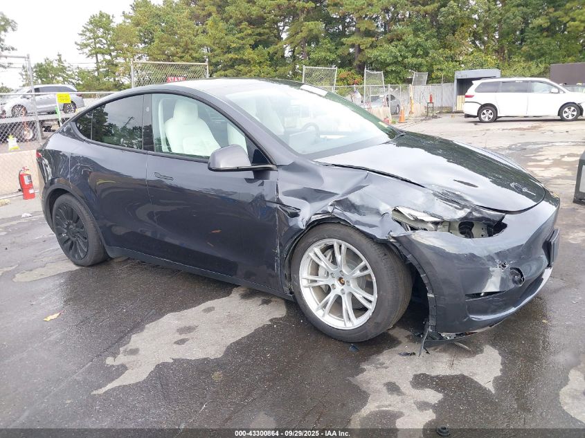 2024 Tesla Model Y Long Range Dual Motor All-Wheel Drive VIN: 7SAYGDEEXRA255294 Lot: 43300864