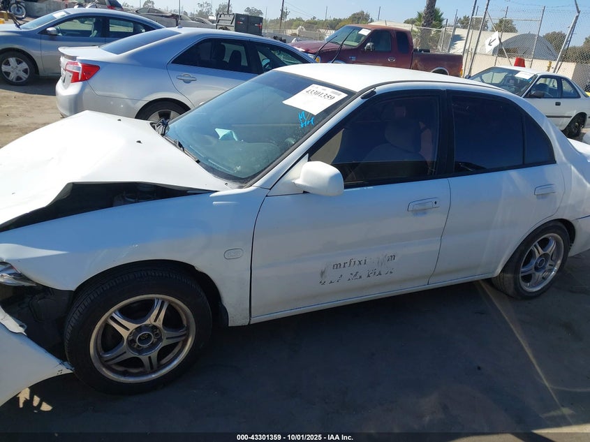 2001 Mitsubishi Mirage Ls VIN: JA3AY36C31U016573 Lot: 43301359