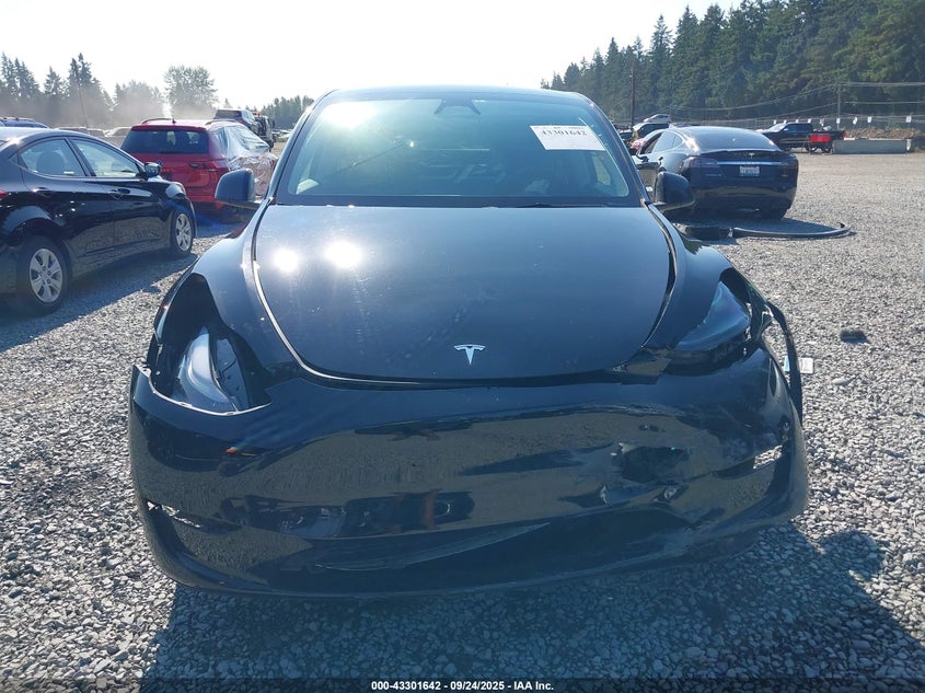 2023 Tesla Model Y Awd/Long Range Dual Motor All-Wheel Drive VIN: 7SAYGDEE7PF853133 Lot: 43301642