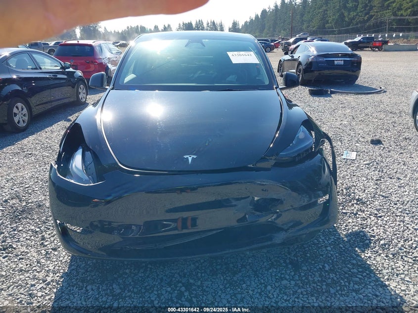 2023 Tesla Model Y Awd/Long Range Dual Motor All-Wheel Drive VIN: 7SAYGDEE7PF853133 Lot: 43301642