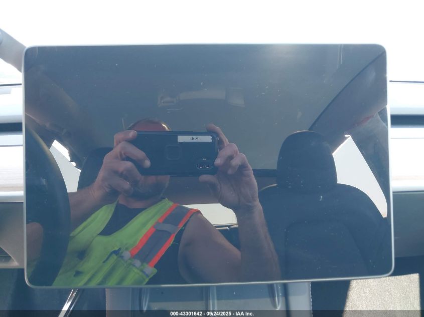 2023 Tesla Model Y Awd/Long Range Dual Motor All-Wheel Drive VIN: 7SAYGDEE7PF853133 Lot: 43301642