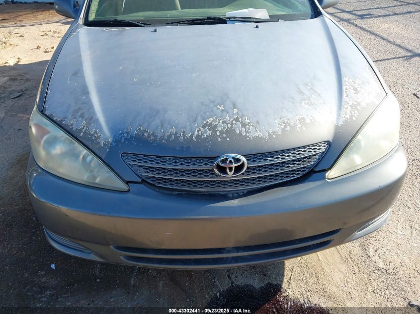 2003 Toyota Camry Le VIN: 4T1BE30K13U725595 Lot: 43302441