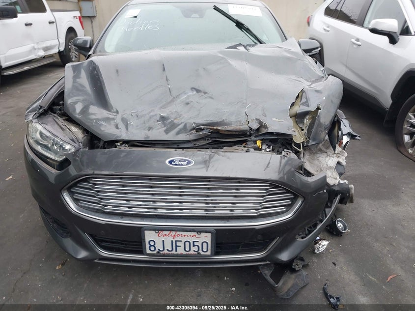 2016 Ford Fusion Energi Titanium VIN: 3FA6P0SUXGR241554 Lot: 43305394