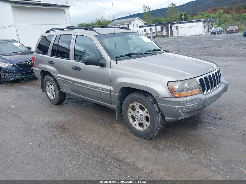 1J4GW58S1XC673530 1999 Jeep Grand Cherokee Laredo auction photo 1