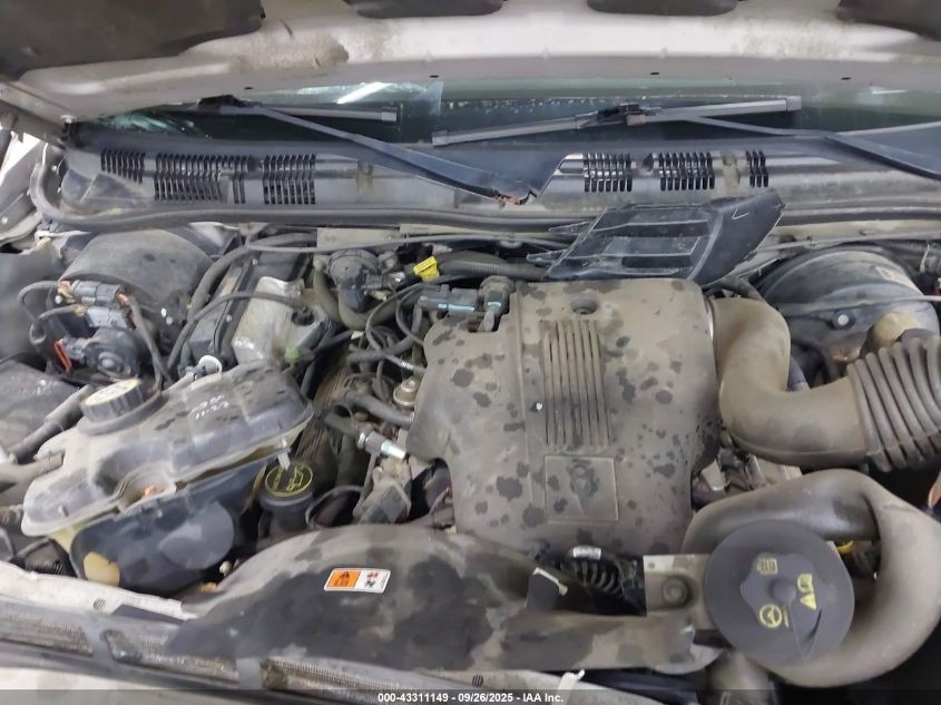 2003 Mercury Grand Marquis Gs VIN: 2MEFM74W43X707970 Lot: 43311149