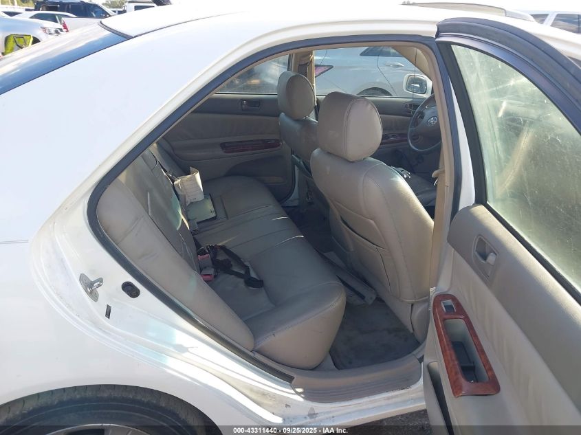 2004 Toyota Camry Le VIN: JTDBE32K940269243 Lot: 43311440