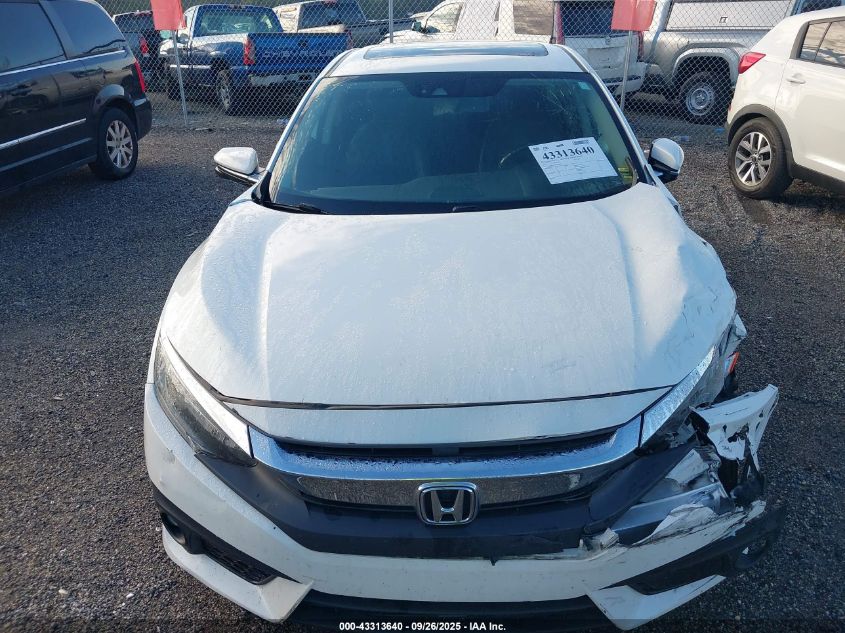 2018 Honda Civic Touring VIN: JHMFC1F97JX038538 Lot: 43313640