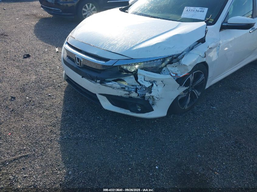 2018 Honda Civic Touring VIN: JHMFC1F97JX038538 Lot: 43313640