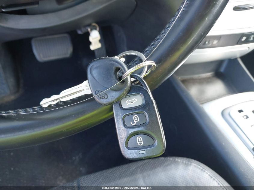 2007 Kia Optima Ex V6 VIN: KNAGE124275117417 Lot: 43313966