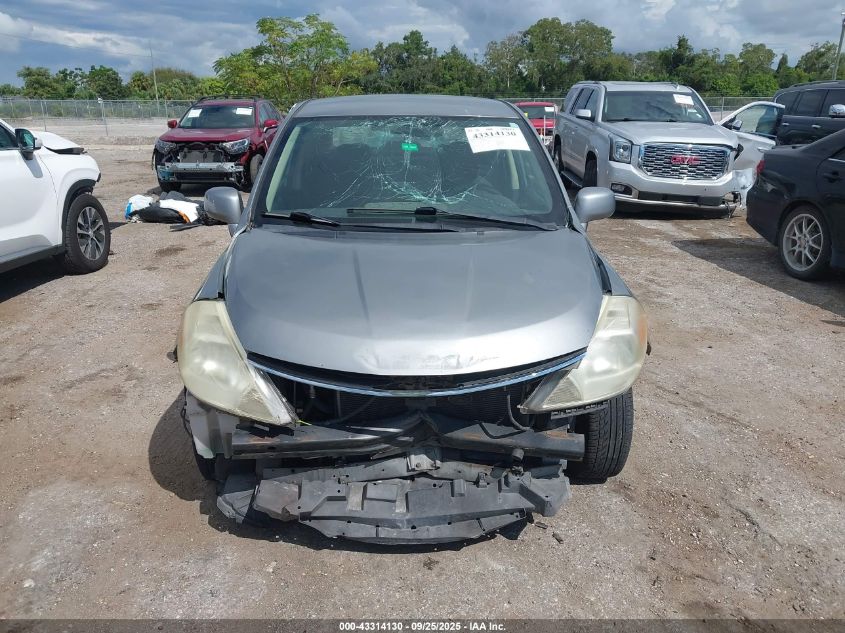2009 Nissan Versa 1.8S VIN: 3N1BC11E39L409418 Lot: 43314130