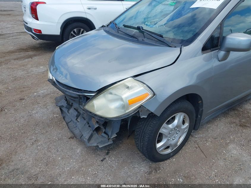 2009 Nissan Versa 1.8S VIN: 3N1BC11E39L409418 Lot: 43314130
