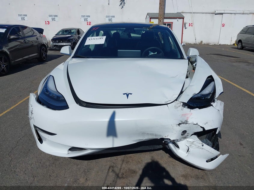2020 Tesla Model 3 Standard Range Plus Rear-Wheel Drive/Standard Range Rear-Wheel Drive VIN: 5YJ3E1EA0LF709197 Lot: 43314289