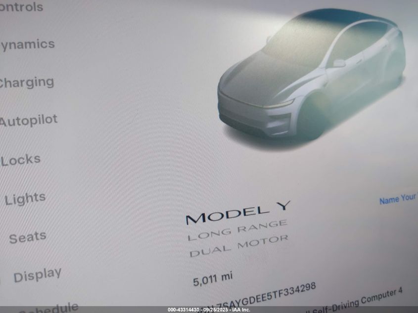 2026 Tesla Model Y Long Range Dual Motor All-Wheel Drive/Long Range Launch Series VIN: 7SAYGDEE5TF334298 Lot: 43314430