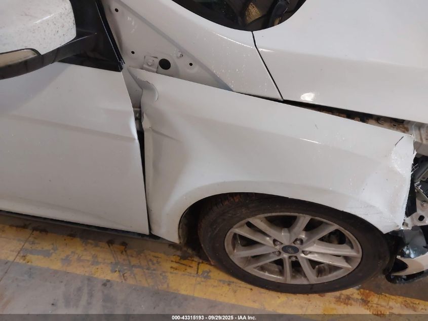 2015 Ford Focus Se VIN: 1FADP3F23FL242818 Lot: 43315193