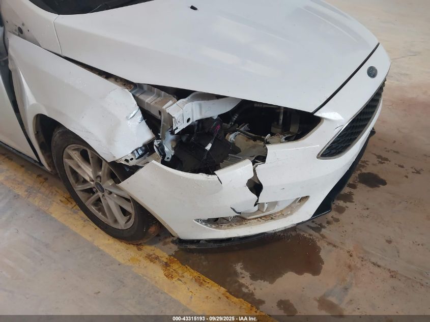 2015 Ford Focus Se VIN: 1FADP3F23FL242818 Lot: 43315193