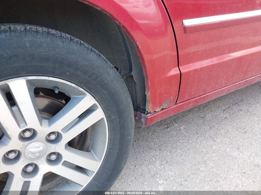 2009 Dodge Grand Caravan Sxt VIN: 2D8HN54X89R593491 Lot: 43315922