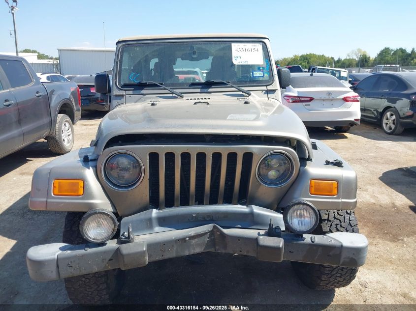 2004 Jeep Wrangler Sahara VIN: 1J4FA59S74P718659 Lot: 43316154