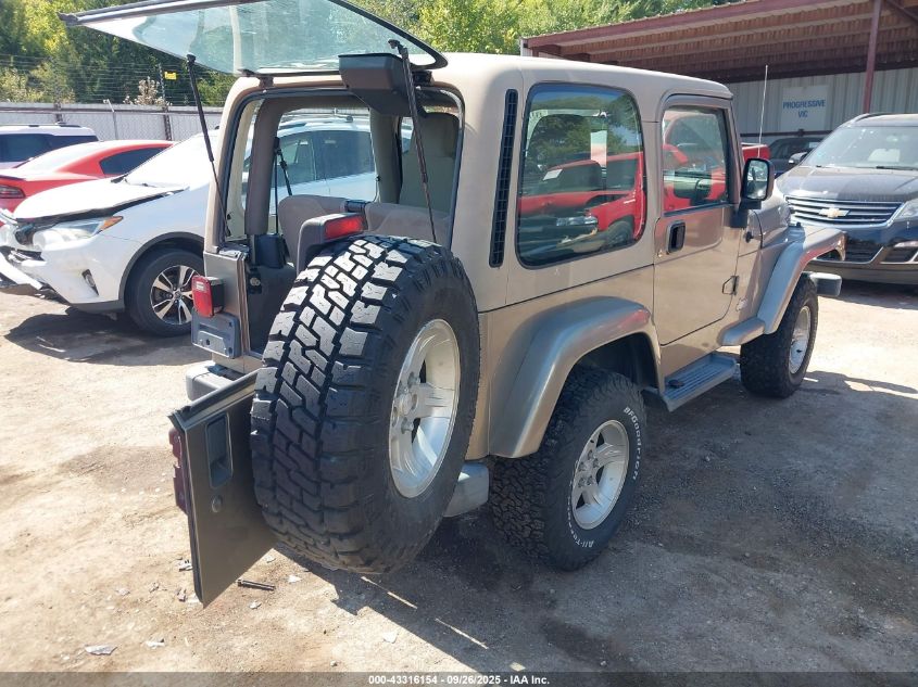 2004 Jeep Wrangler Sahara VIN: 1J4FA59S74P718659 Lot: 43316154