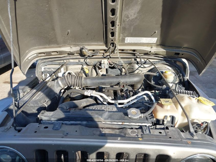 2004 Jeep Wrangler Sahara VIN: 1J4FA59S74P718659 Lot: 43316154