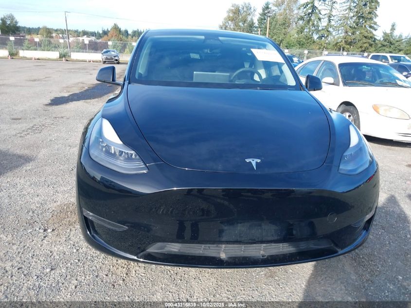 2023 Tesla Model Y Awd/Long Range Dual Motor All-Wheel Drive VIN: 7SAYGDEE1PF760009 Lot: 43316839