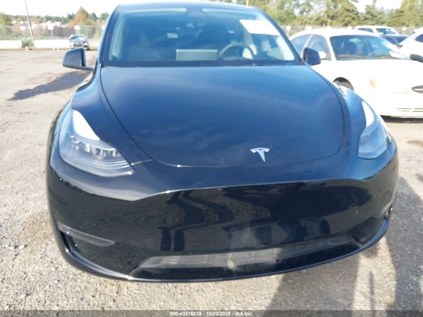 2023 Tesla Model Y Awd/Long Range Dual Motor All-Wheel Drive VIN: 7SAYGDEE1PF760009 Lot: 43316839