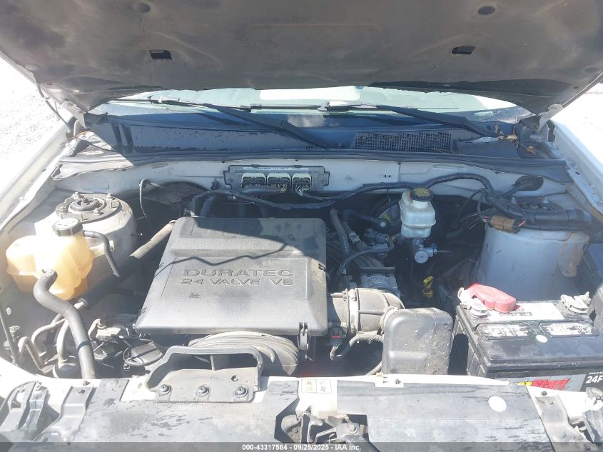 2009 Mercury Mariner V6 VIN: 4M2CU81G09KJ25958 Lot: 43317584