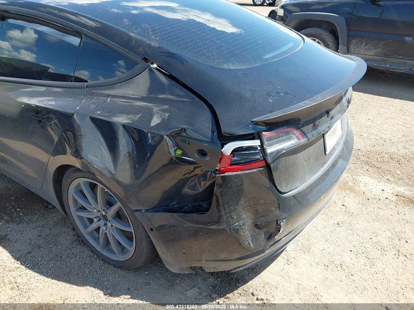 2021 Tesla Model 3 Standard Range Plus Rear-Wheel Drive VIN: 5YJ3E1EA0MF976311 Lot: 43318303