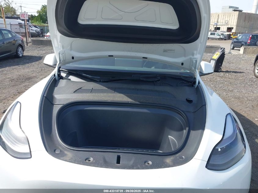 2023 Tesla Model Y Awd/Long Range Dual Motor All-Wheel Drive VIN: 7SAYGAEEXPF759410 Lot: 43318739