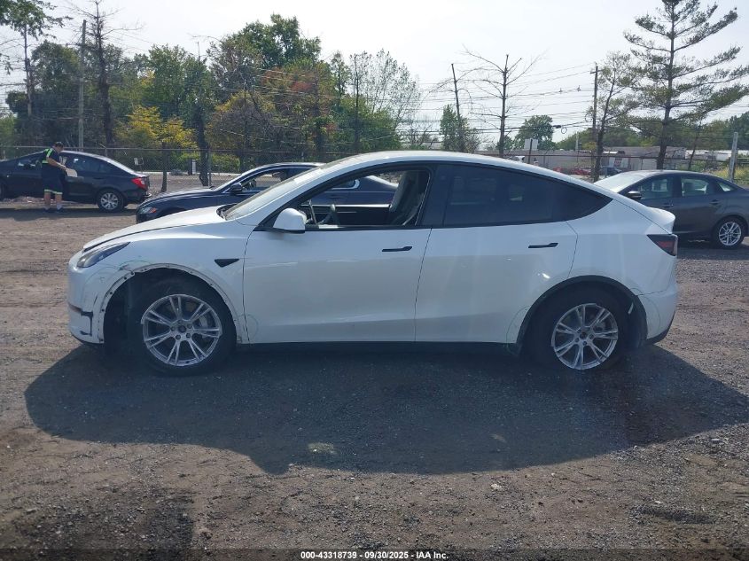 2023 Tesla Model Y Awd/Long Range Dual Motor All-Wheel Drive VIN: 7SAYGAEEXPF759410 Lot: 43318739