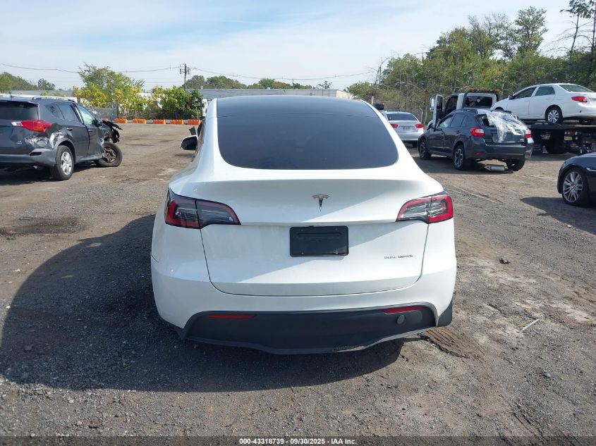 2023 Tesla Model Y Awd/Long Range Dual Motor All-Wheel Drive VIN: 7SAYGAEEXPF759410 Lot: 43318739
