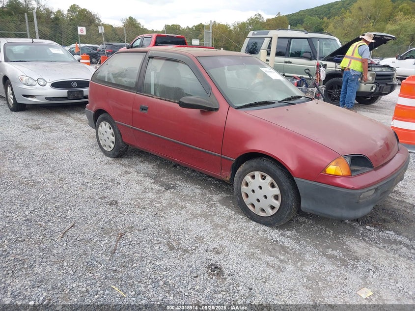 2C1MR2467R6792389 1994 Geo Metro auction photo 1