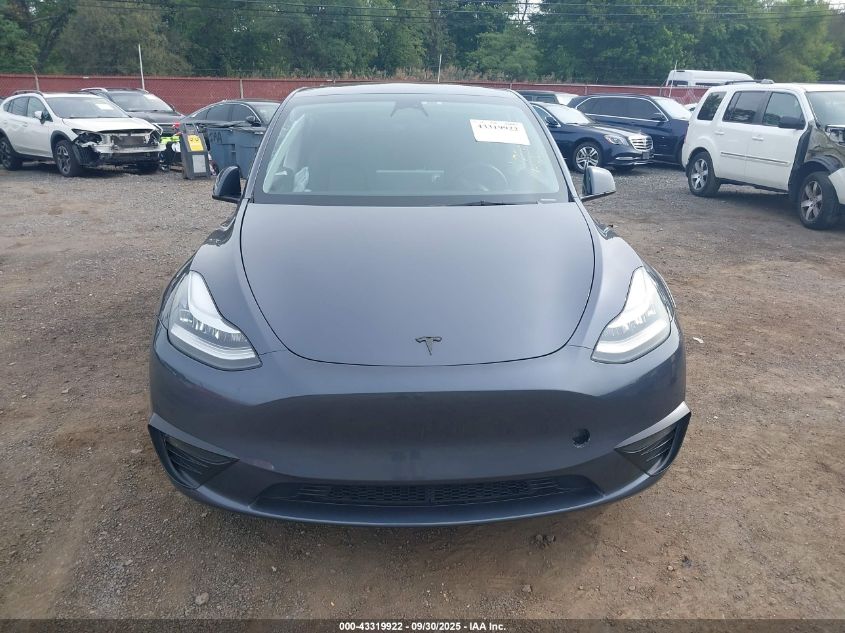 2023 Tesla Model Y Awd/Long Range Dual Motor All-Wheel Drive VIN: 7SAYGDEE7PA078717 Lot: 43319922