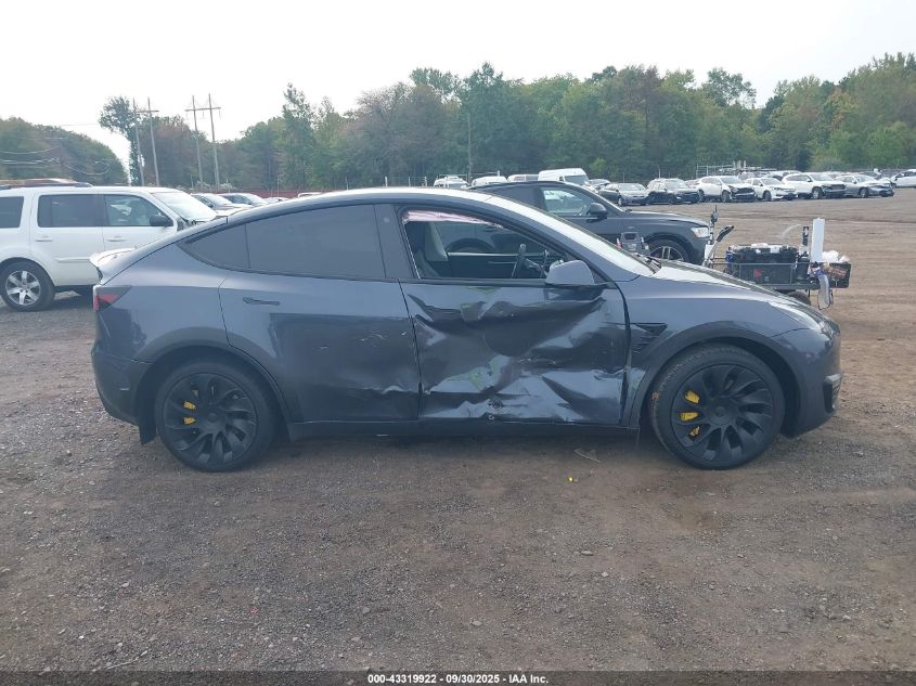 2023 Tesla Model Y Awd/Long Range Dual Motor All-Wheel Drive VIN: 7SAYGDEE7PA078717 Lot: 43319922