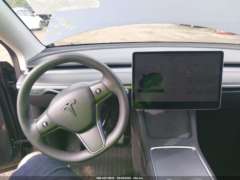 2023 Tesla Model Y Awd/Long Range Dual Motor All-Wheel Drive VIN: 7SAYGDEE7PA078717 Lot: 43319922