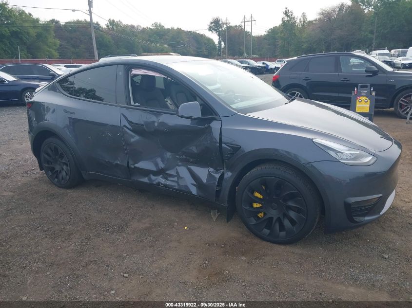 2023 Tesla Model Y Awd/Long Range Dual Motor All-Wheel Drive VIN: 7SAYGDEE7PA078717 Lot: 43319922