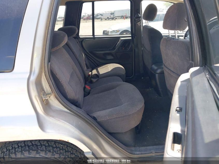 2001 Jeep Grand Cherokee Laredo VIN: 1J4GW48SX1C728557 Lot: 43319993