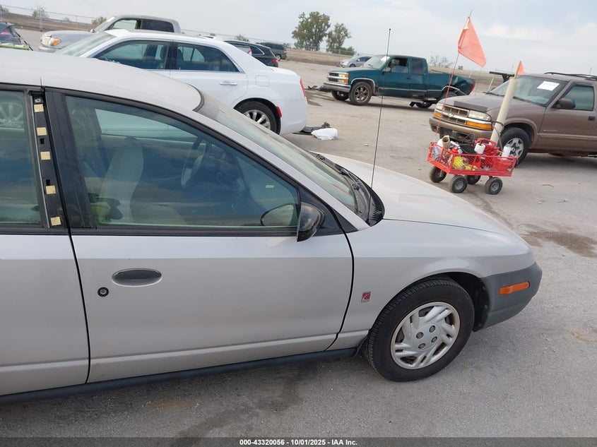 2000 Saturn Sl VIN: 1G8ZF5281YZ256297 Lot: 43320056