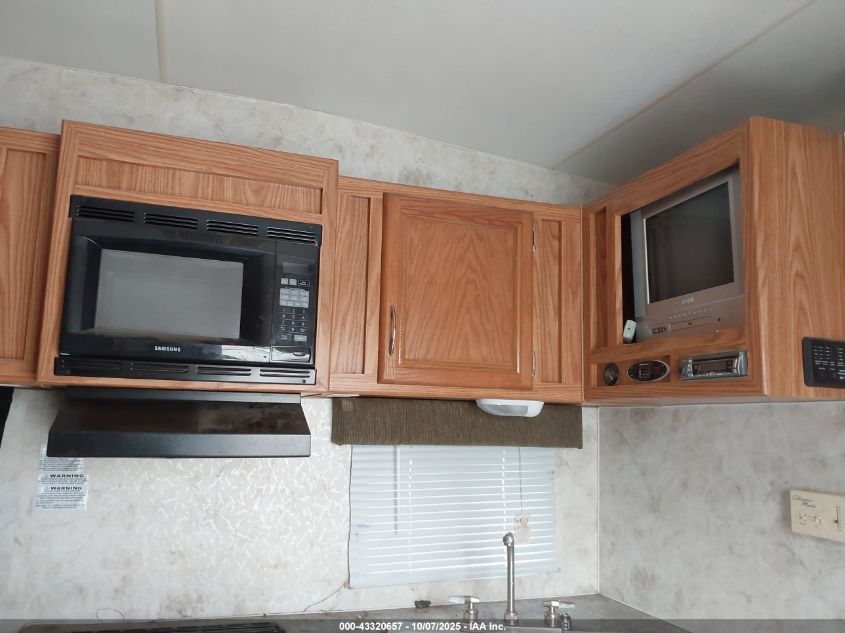 2005 Eclipse Attitude / 26Fsak / VIN: 5LZBE26225S002703 Lot: 43320657