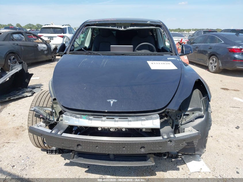 2025 Tesla Model Y Long Range Dual Motor Rear-Wheel Drive VIN: 7SAYGDED6SA359486 Lot: 43322820