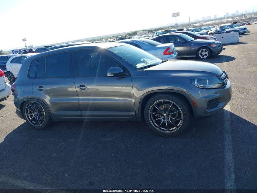 2014 VOLKSWAGEN TIGUAN S WVGAV3AX7EW618824